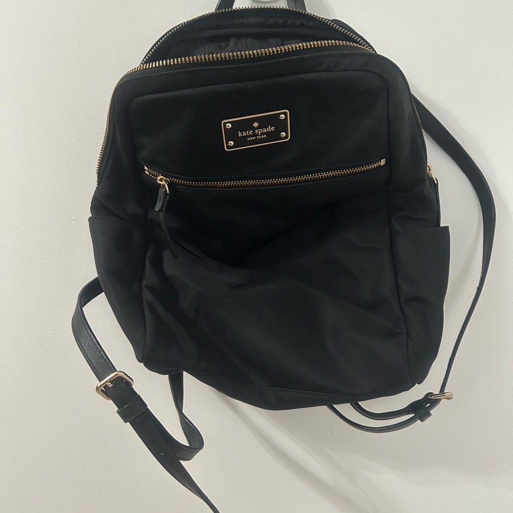 Kate Spade Black Interior with Gold Accents